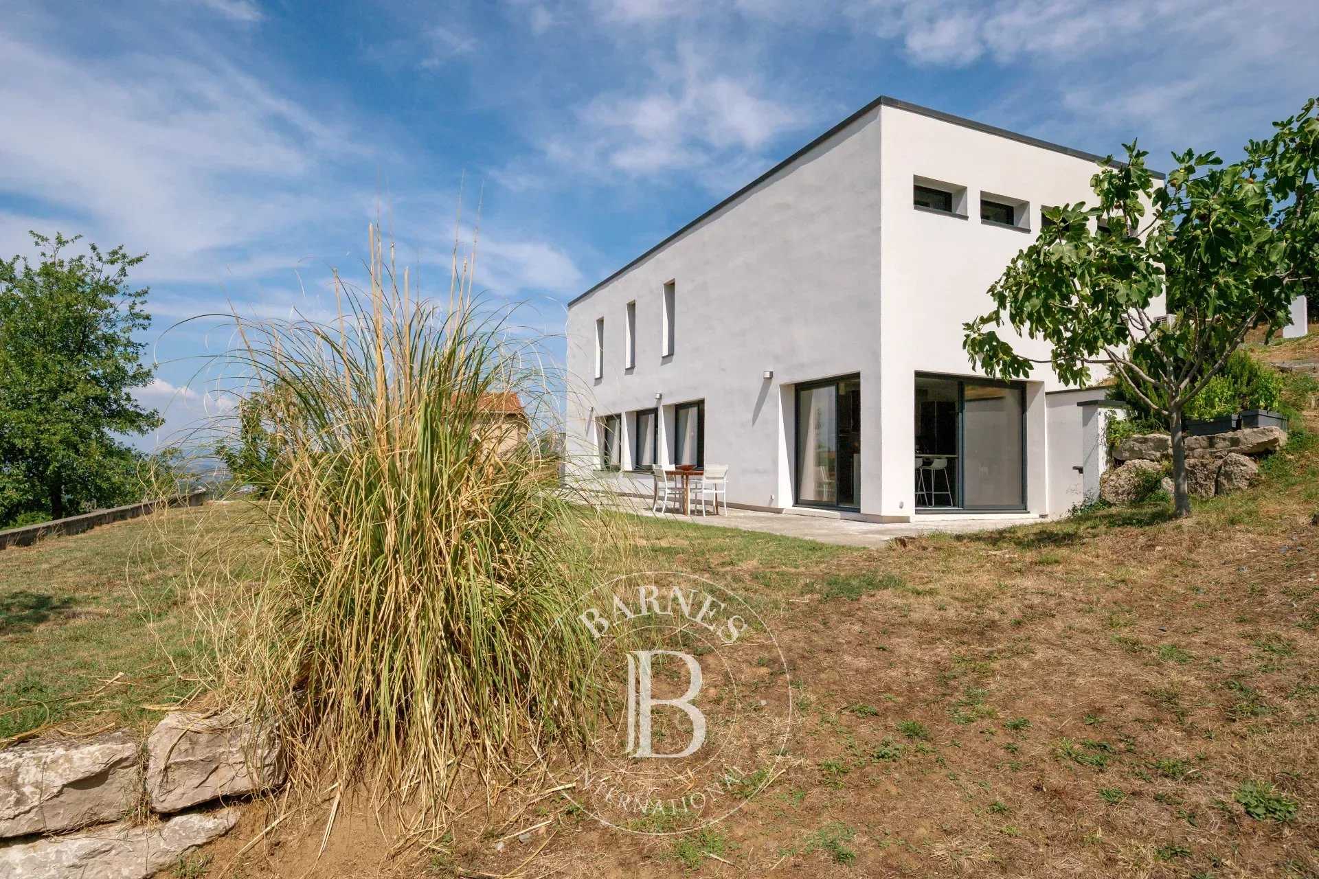 Chevinay - Maison d'architecte d'environ 190 m² - Terrain de 1207 m² - Garage double - 3 Chambres